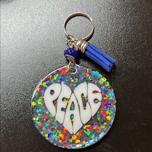 Colorful Peace Keychain with Blue Tassel